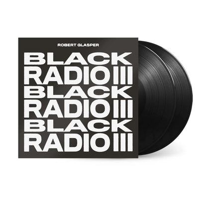 Vinyl record and album cover of 'Black Radio III' by Robert Glasper on a white background
