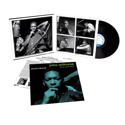 Vinyl record with 'Blue Train' by John Coltrane and album cover featuring a portrait of the musician.