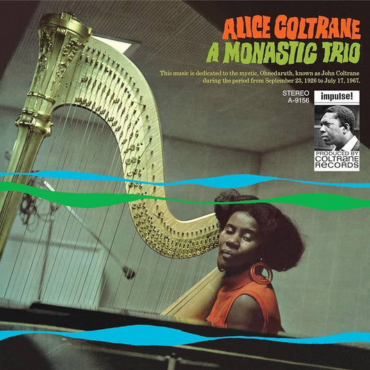 Album cover of 'A Monastic Trio' by Alice Coltrane featuring a harp and a woman.