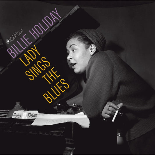Album cover featuring Billie Holiday with text 'Lady Sings the Blues' and 'Jazz Masters' on a piano.