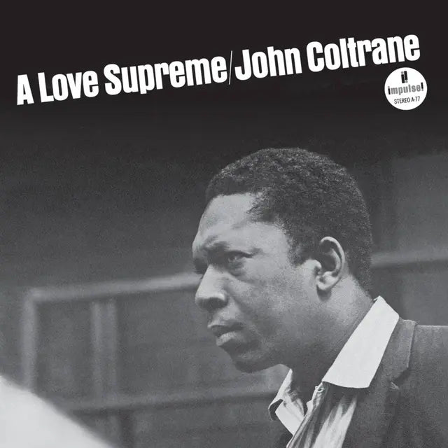 Album cover of 'A Love Supreme' by John Coltrane with a black and white portrait of the musician.
