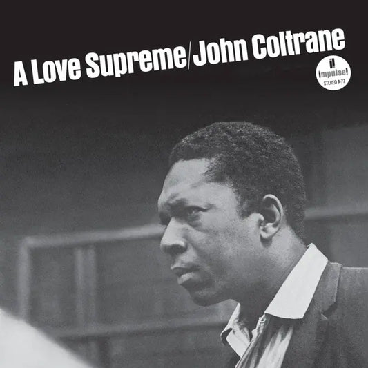 Album cover of 'A Love Supreme' by John Coltrane with a black and white portrait of the musician.