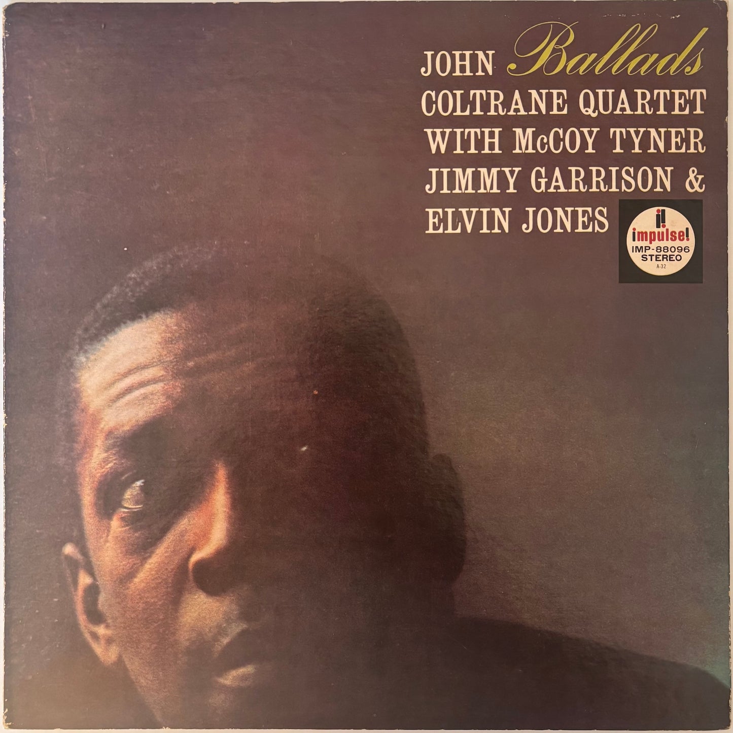 Album cover of Ballads by John Coltrane Quartet with McCoy Tyner, Jimmy Garrison & Elvin Jones featuring a close-up portrait.