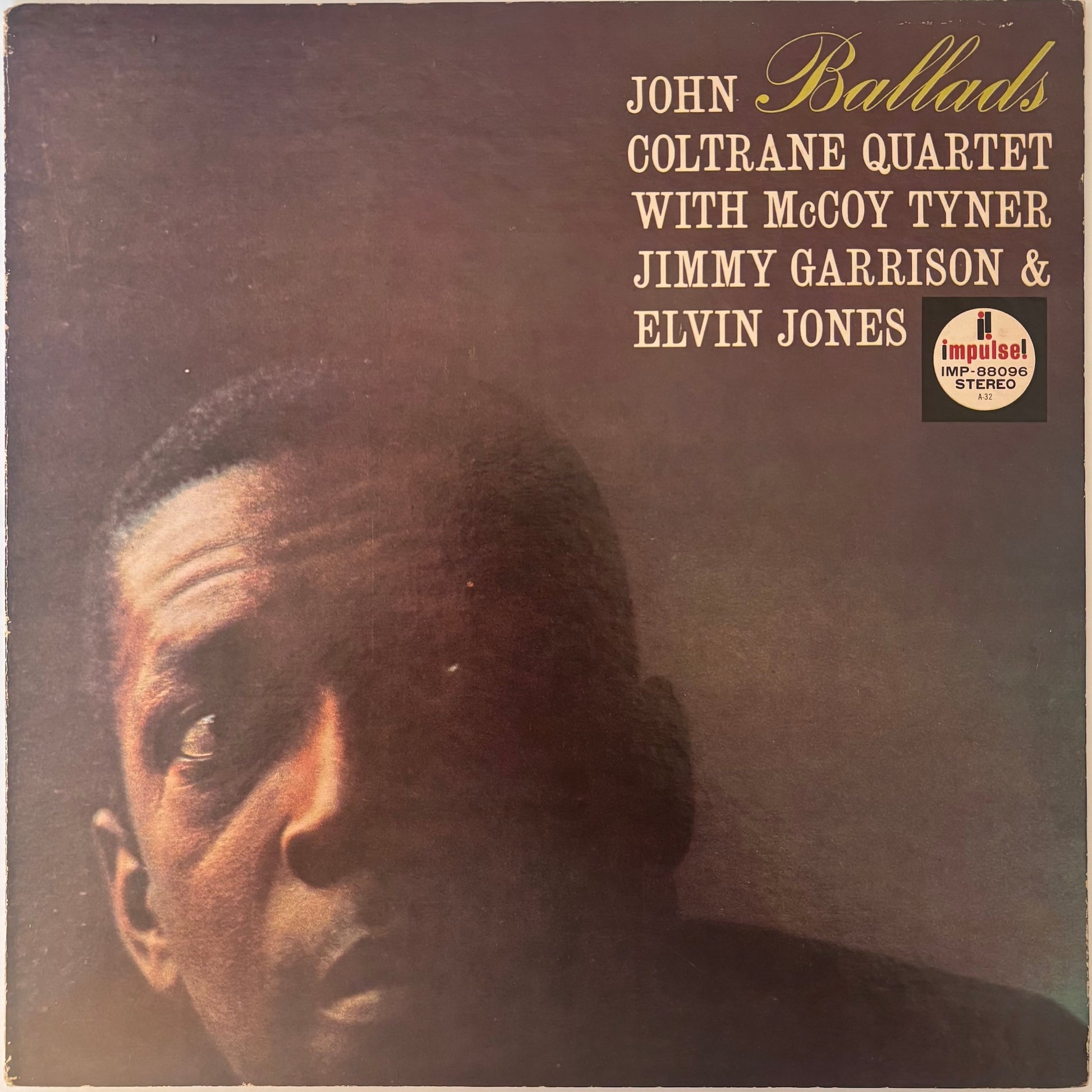 Album cover of Ballads by John Coltrane Quartet with McCoy Tyner, Jimmy Garrison & Elvin Jones featuring a close-up portrait.