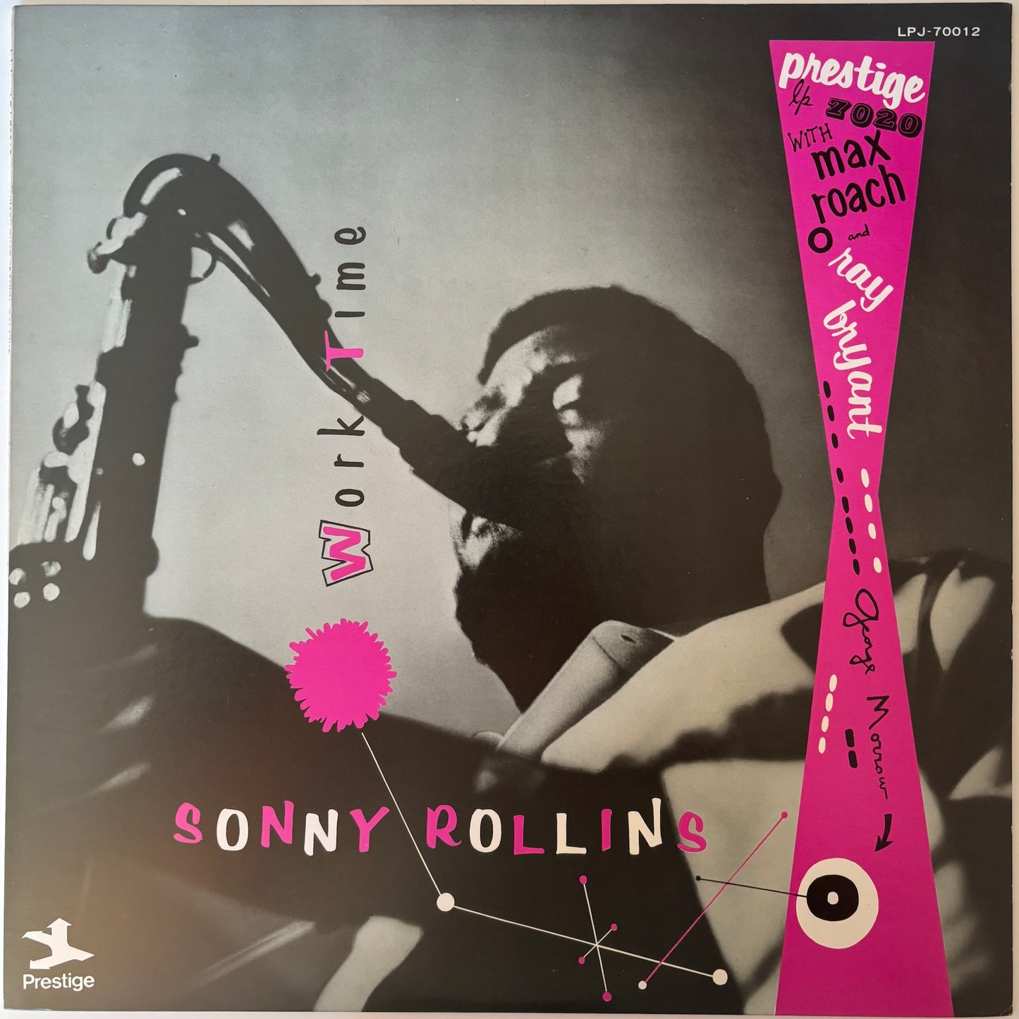 Album cover of Sonny Rollins' 'Work Time' featuring a saxophonist and pink text design.