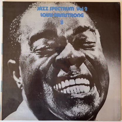 Album cover of vinyl record 'Jazz Spectrum Vol. 2' by Louis Armstrong with a close-up of his face.