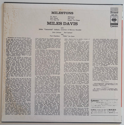 Back cover of a Miles Davis album 'Milestones' with text and record label.