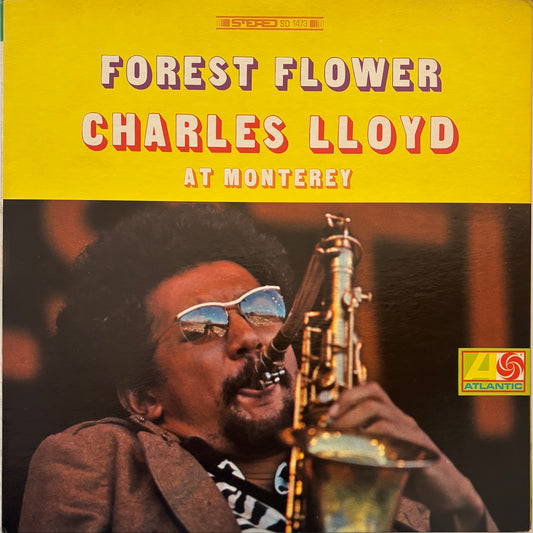 Album cover of 'Forest Flower' by Charles Lloyd at Monterey on a yellow background.
