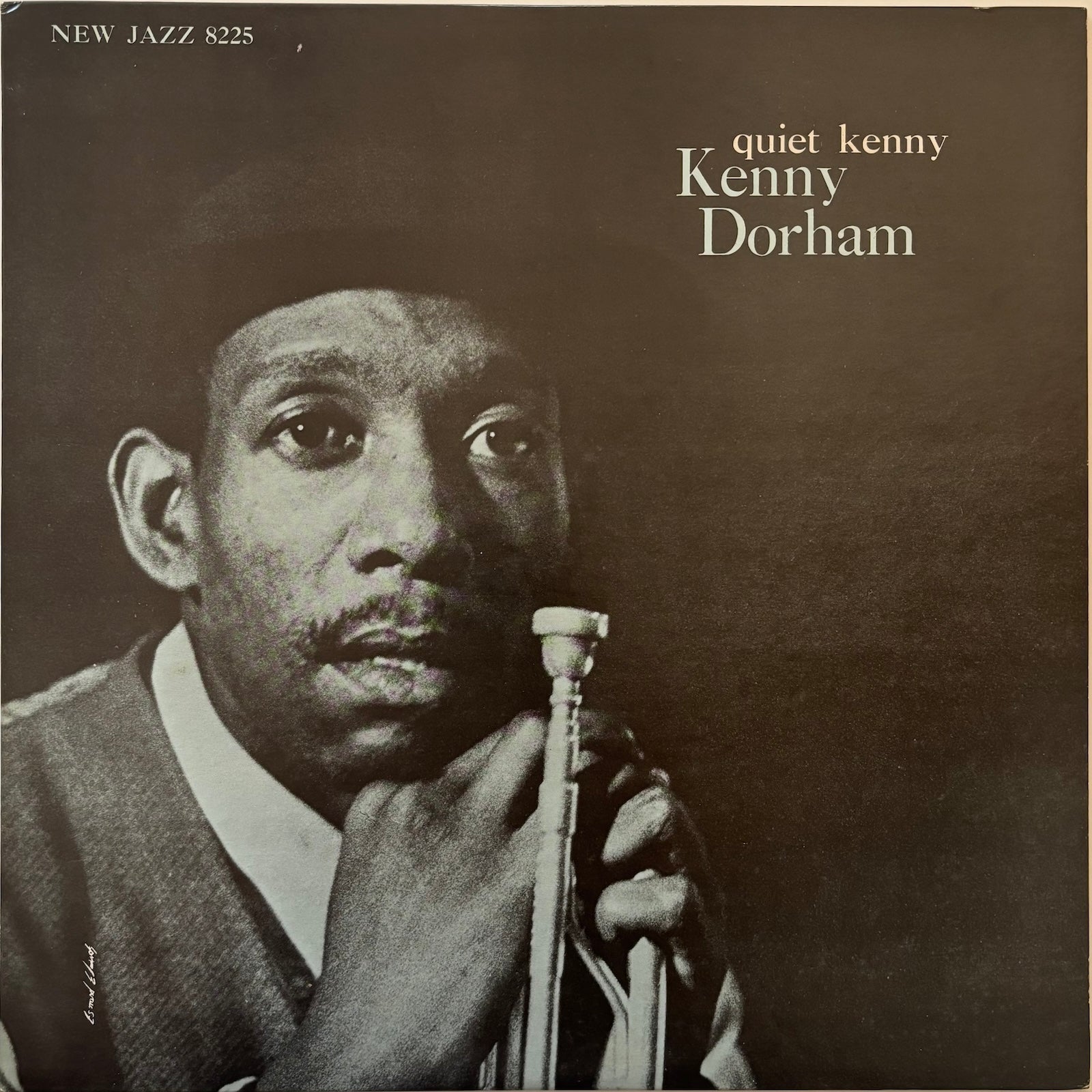 Album cover featuring a black and white portrait of a musician holding a trumpet with text 'quiet kenny Kenny Dorham' on a brown background.