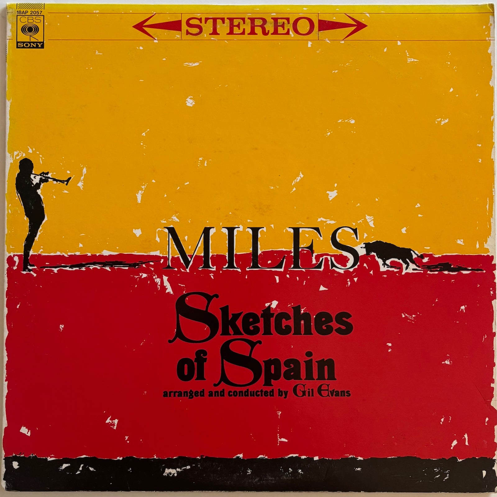 Album cover of 'Sketches of Spain' by Miles Davis with a yellow and red design.
