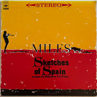 Album cover of 'Sketches of Spain' by Miles Davis with a yellow and red design.