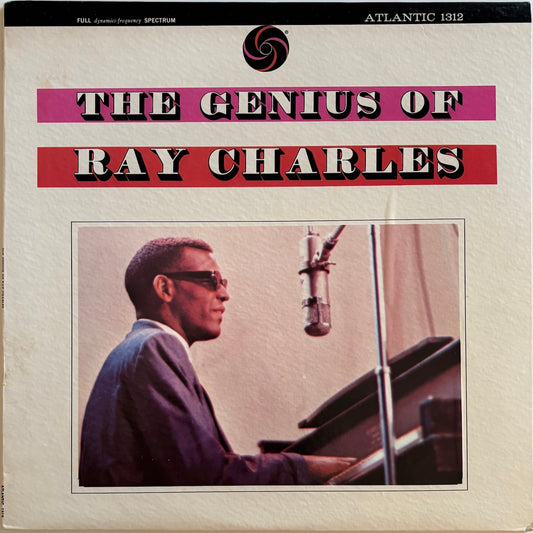 Album cover of 'The Genius of Ray Charles' featuring a portrait of Ray Charles playing piano.