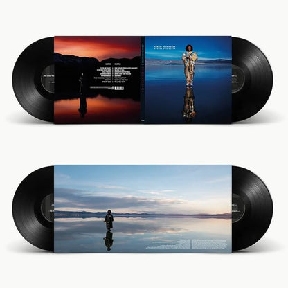 Vinyl records and gatefold of Heaven and Earth by Kamasi Washington.