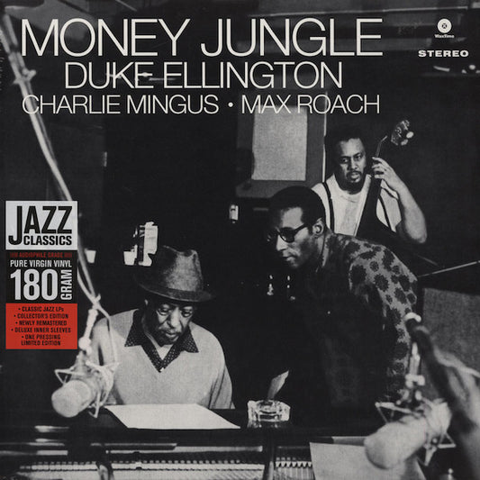 Album cover of 'Money Jungle' by Duke Ellington featuring musicians in a recording studio.